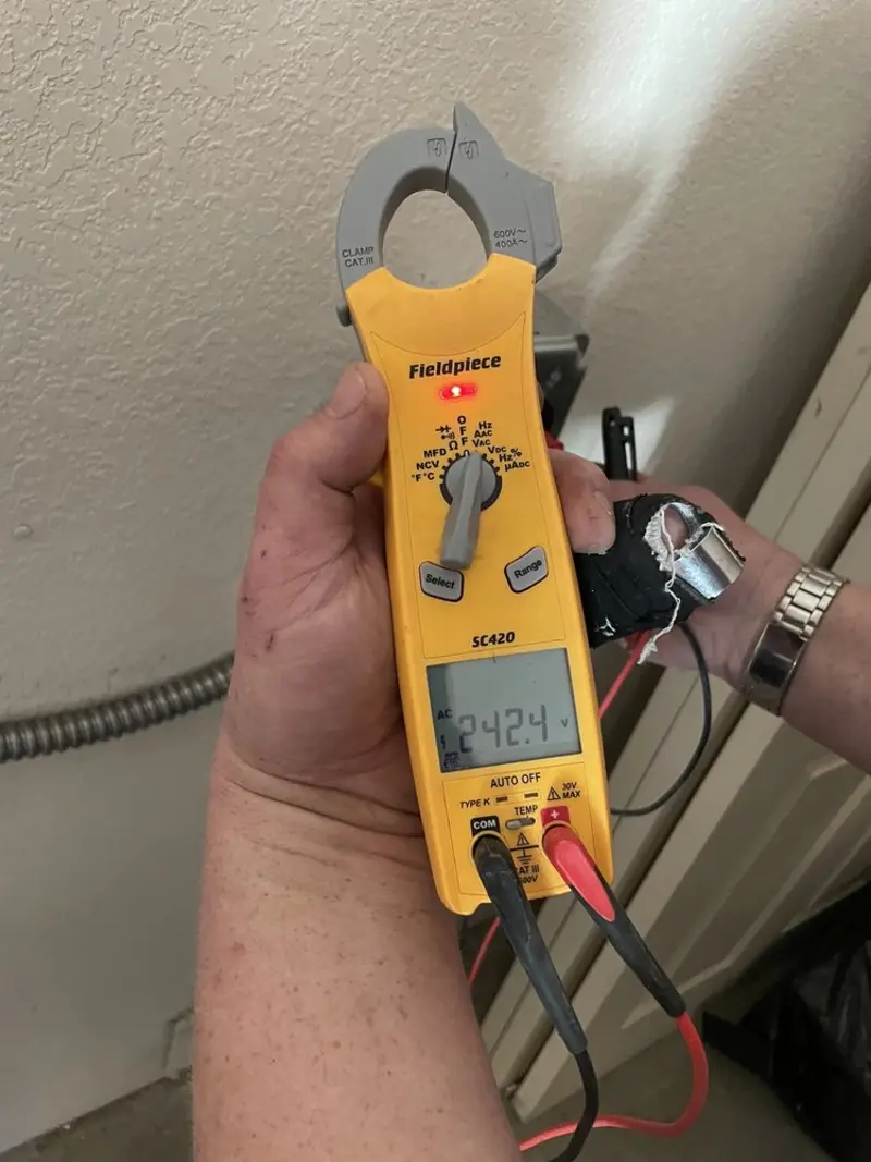 Voltage testing with clamp meter during Electrical Installation Services in Graham